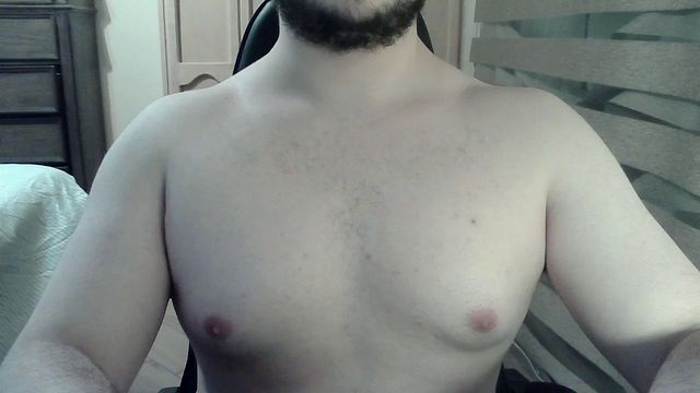 Muscular jock shows off his strength on camera